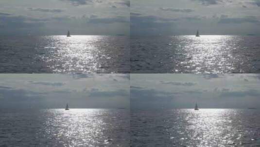 在风平浪静的海面上航行的帆船高清在线视频素材下载