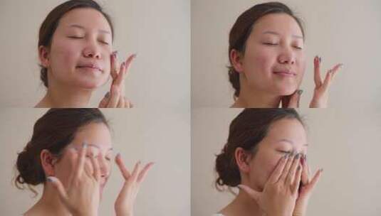 亚洲女人室内使用护肤霜均匀涂抹脸部高清在线视频素材下载