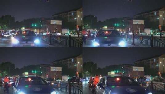 红绿灯行人都市车流人流城市生活夜晚夜景高清在线视频素材下载