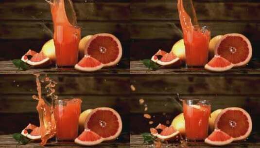 慢动作血橙落在一杯果汁里高清在线视频素材下载