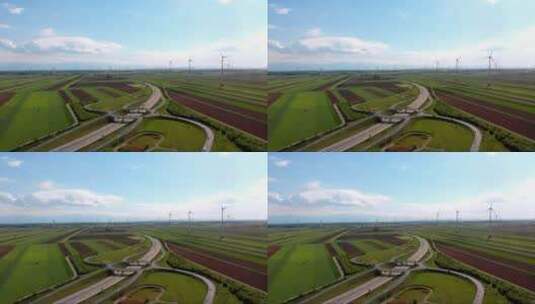 公路交通和农村的风力发电场高清在线视频素材下载