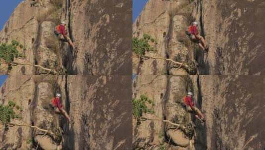 登山运动员从岩石山上下来高清在线视频素材下载