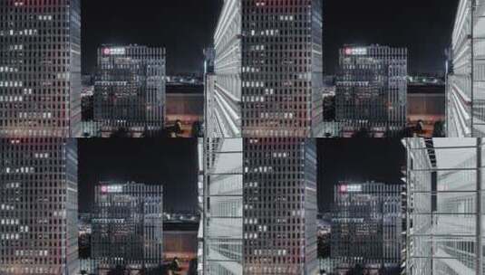 4K航拍上海城市夜景办公楼近景穿越高清在线视频素材下载