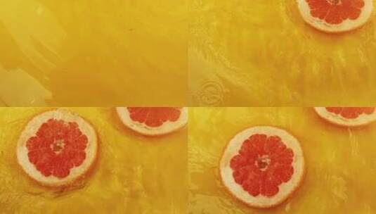 水果掉到水里柚子西柚泡水高清在线视频素材下载