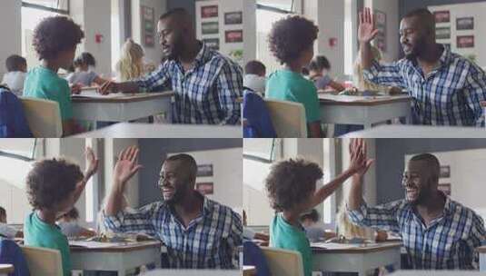 快乐的非裔美国男老师和非裔美国男孩拍手的视频高清在线视频素材下载