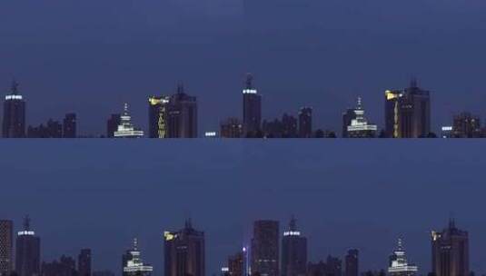 武汉东湖地拍夜晚建筑天空留白高清在线视频素材下载