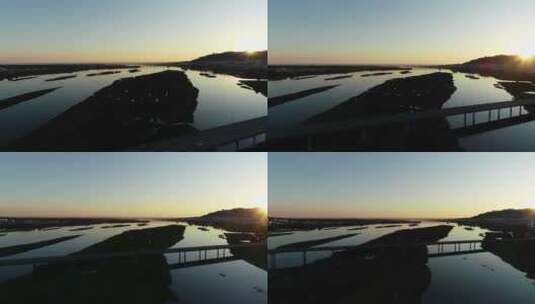 航拍夕阳下的河流高清在线视频素材下载