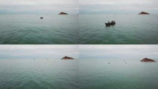 湖面上渔船渔民高清在线视频素材下载