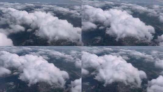 云朵下的航拍城市高清在线视频素材下载