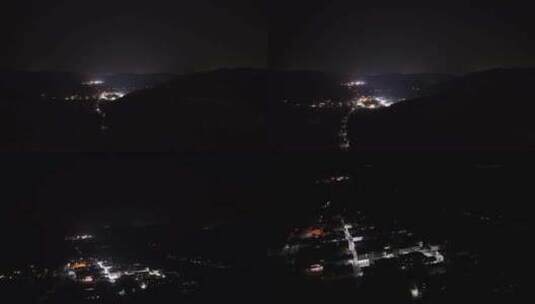 夜晚山林飞向城镇高清在线视频素材下载