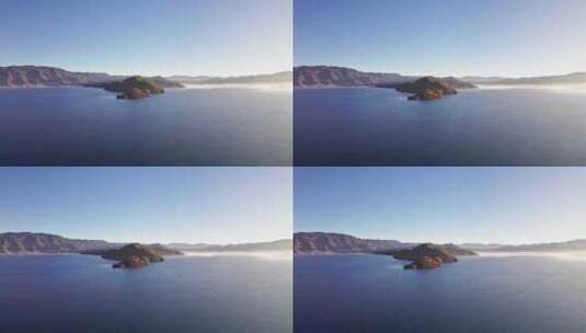 云南丽江泸沽湖中的岛屿日出清晨航拍高视角高清在线视频素材下载