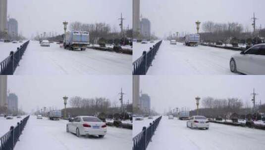 4k北方城市下大雪的马路上的除雪车除雪高清在线视频素材下载