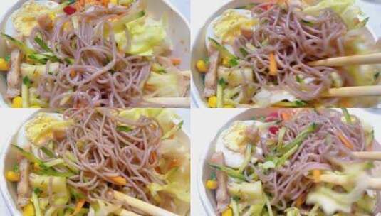 减脂餐蔬菜沙拉筷子荞麦面搅拌慢动作高清在线视频素材下载