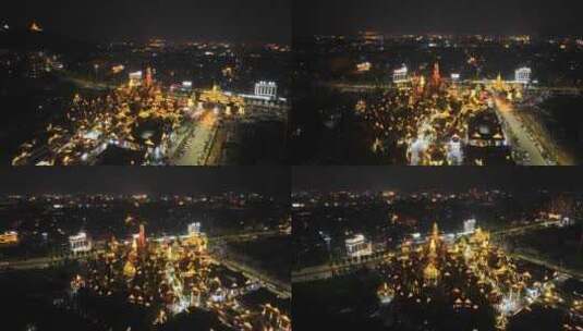 云南德宏芒市傣族古镇夜景航拍高清在线视频素材下载