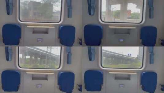 行驶中火车窗外的城市高清在线视频素材下载