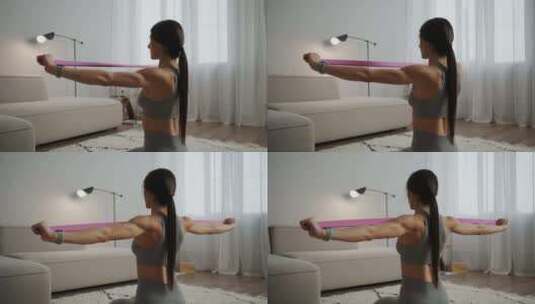 主页健身和运动运动女士训练手臂和背部，带高清在线视频素材下载
