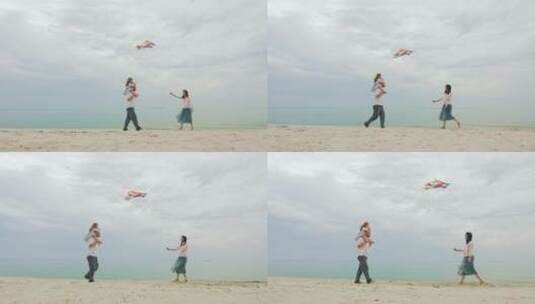 一家人在海边放风筝高清在线视频素材下载