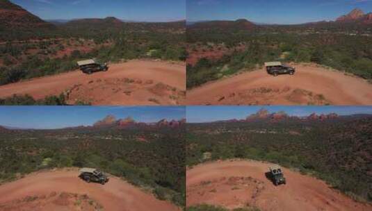 吉普车在山路上行驶航拍高清在线视频素材下载