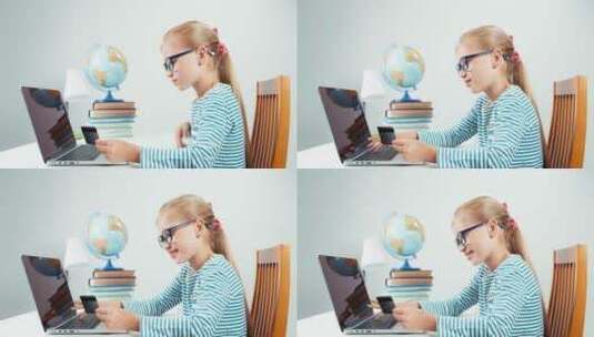 使用笔记本电脑打字的小女孩高清在线视频素材下载