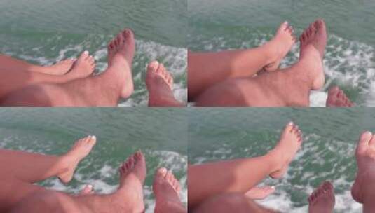 夫妇的脚在海上航行的船上高清在线视频素材下载