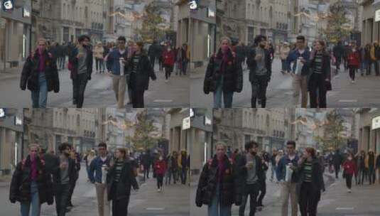街道上行走的人们的长镜头高清在线视频素材下载
