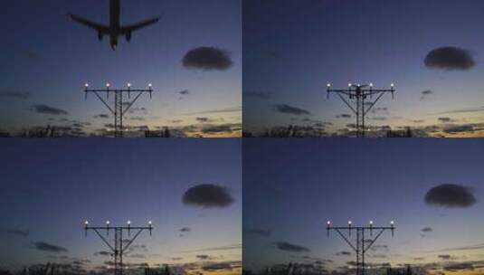 傍晚飞机在机场降落高清在线视频素材下载