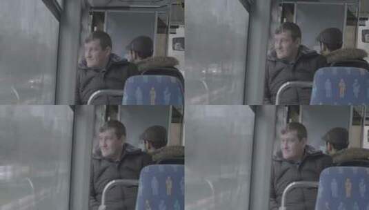 公交车上看向窗外的外国人高清在线视频素材下载