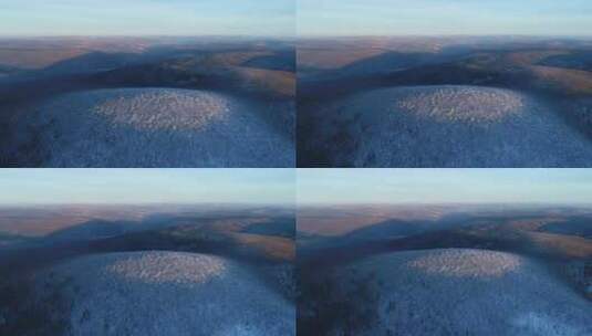 航拍大兴安岭冬季雪色的山岭高清在线视频素材下载