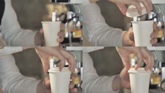 咖啡师给浓缩咖啡盖上盖子高清在线视频素材下载