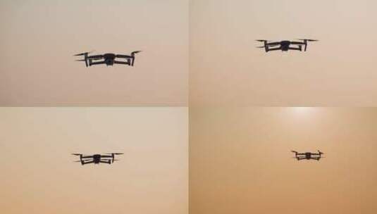 无人机视频金色夕阳里 飞行的大疆御无人机高清在线视频素材下载