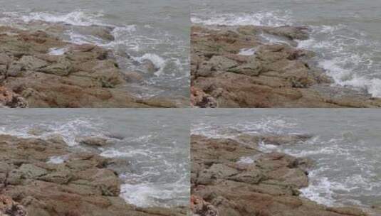海浪拍打石滩空镜画面高清在线视频素材下载