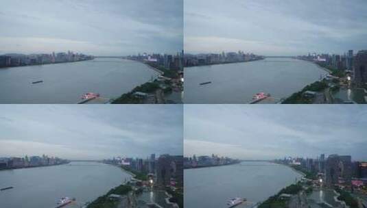 俯拍傍晚钱塘江和滨江现代城市风光高清在线视频素材下载