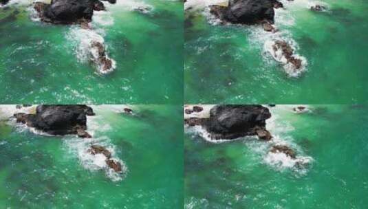 海南万宁海边海浪礁石航拍4k视频高清在线视频素材下载