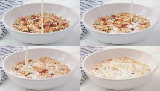 牛奶中混合的麦片健康早餐高清在线视频素材下载