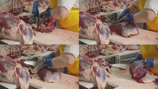 工人们将肉从骨头中分离出来高清在线视频素材下载