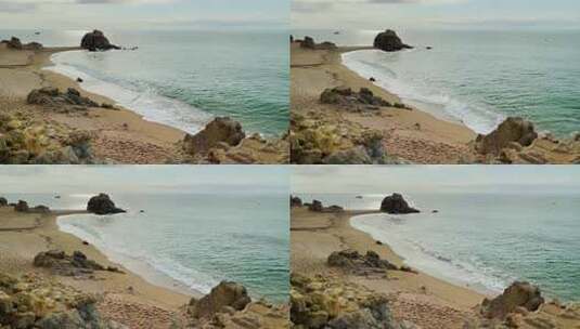 日出时没有人的地中海海滩绿松石蓝色平静的水巴塞罗那海岸Maresme成本高清在线视频素材下载