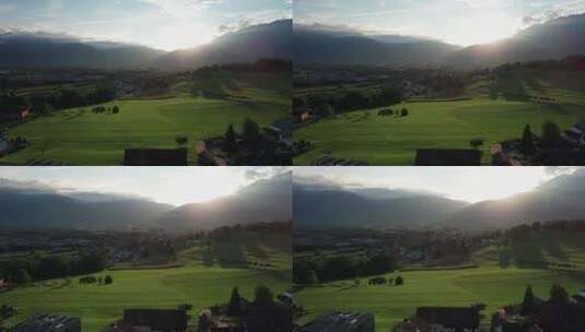 日落时列支敦士登阿尔卑斯山理想绿地的空中景观高清在线视频素材下载