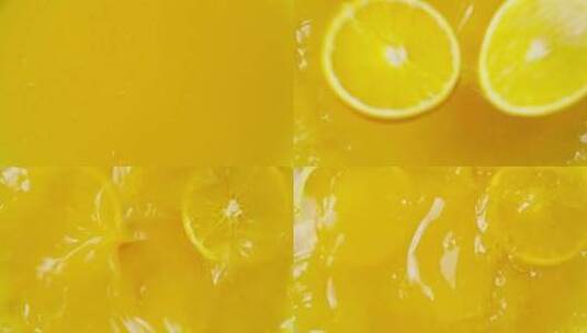 橙子掉入橙汁慢镜特写高清在线视频素材下载
