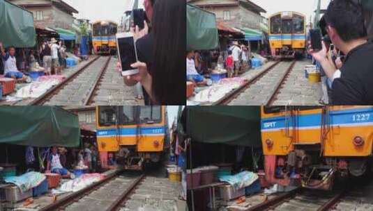 泰国曼谷美功铁路市场火车行驶而过高清在线视频素材下载