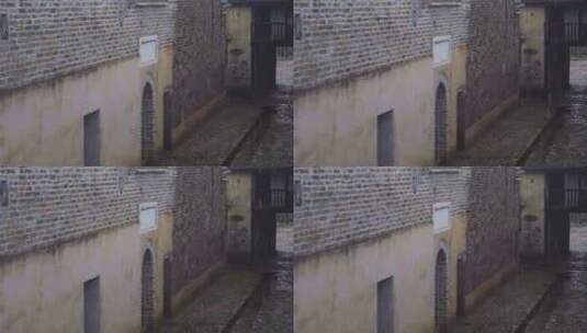 江西赣州龙南乌石围中式建筑雨天禅意空镜头高清在线视频素材下载