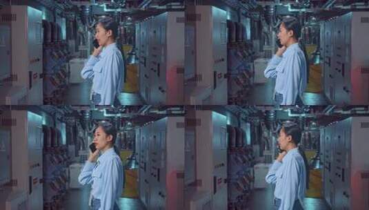 亚洲女工在发动机控制室打电话高清在线视频素材下载