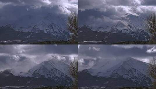 巍峨雄伟雪山云雾延时高清在线视频素材下载