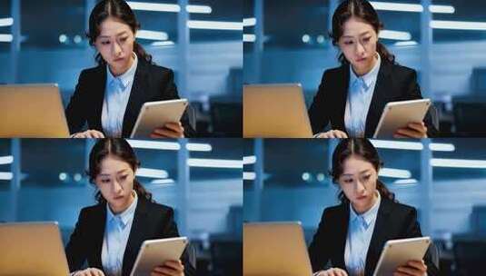 女商人办公室使用笔记本和平板高清在线视频素材下载