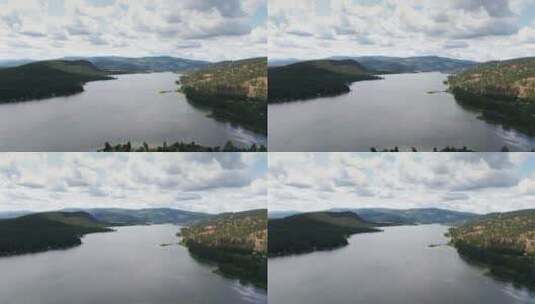 航拍被山丘包围的湖高清在线视频素材下载