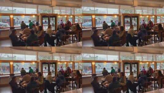 人们坐在咖啡厅高清在线视频素材下载