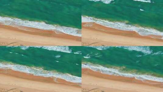 航拍竖版海南万宁神州半岛海浪拍打沙滩高清在线视频素材下载
