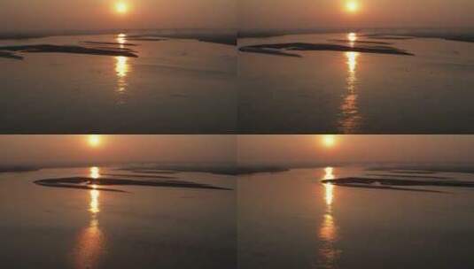 黄河滩涂上日落航拍高清在线视频素材下载