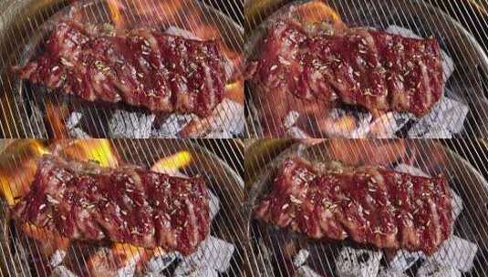 烤肉炭烤烤炉牛排肉排火焰高清在线视频素材下载