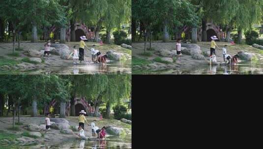 在公园河边玩耍嬉戏的孩子们高清在线视频素材下载