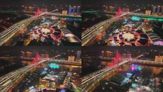 航拍宜昌至喜大桥和西坝夜市和游船高清在线视频素材下载